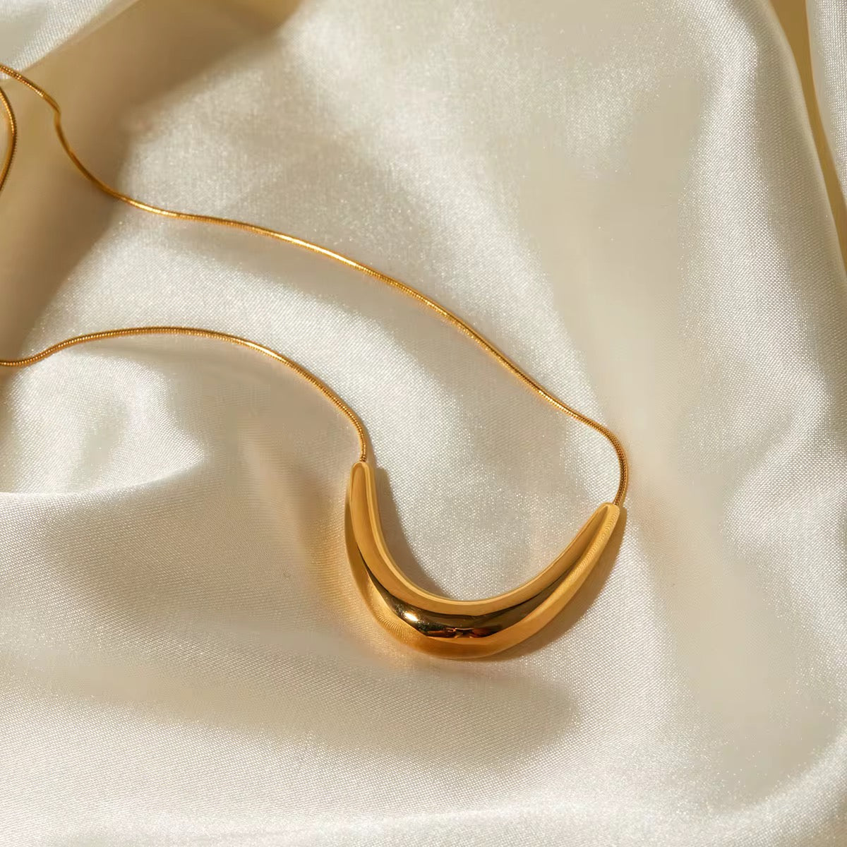 Golden Crescent Curve Necklace