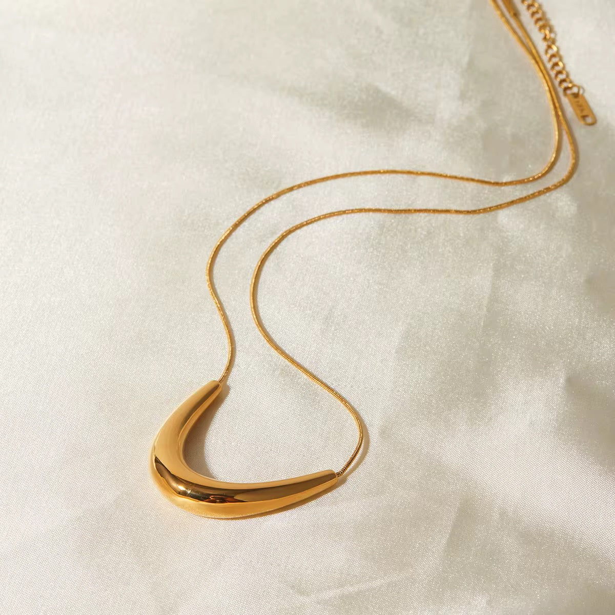 Golden Crescent Curve Necklace